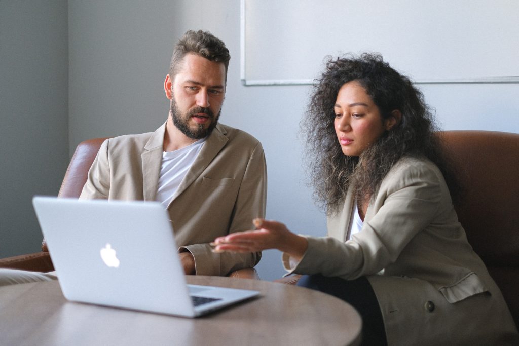 office woman talking to a co-worker